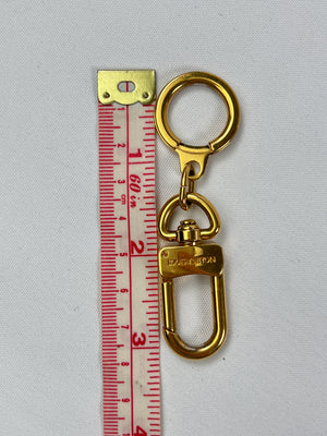 Louis Vuitton Goldtone Metal Small Bolt Key Holder and Strap Extender -  Yoogi's Closet