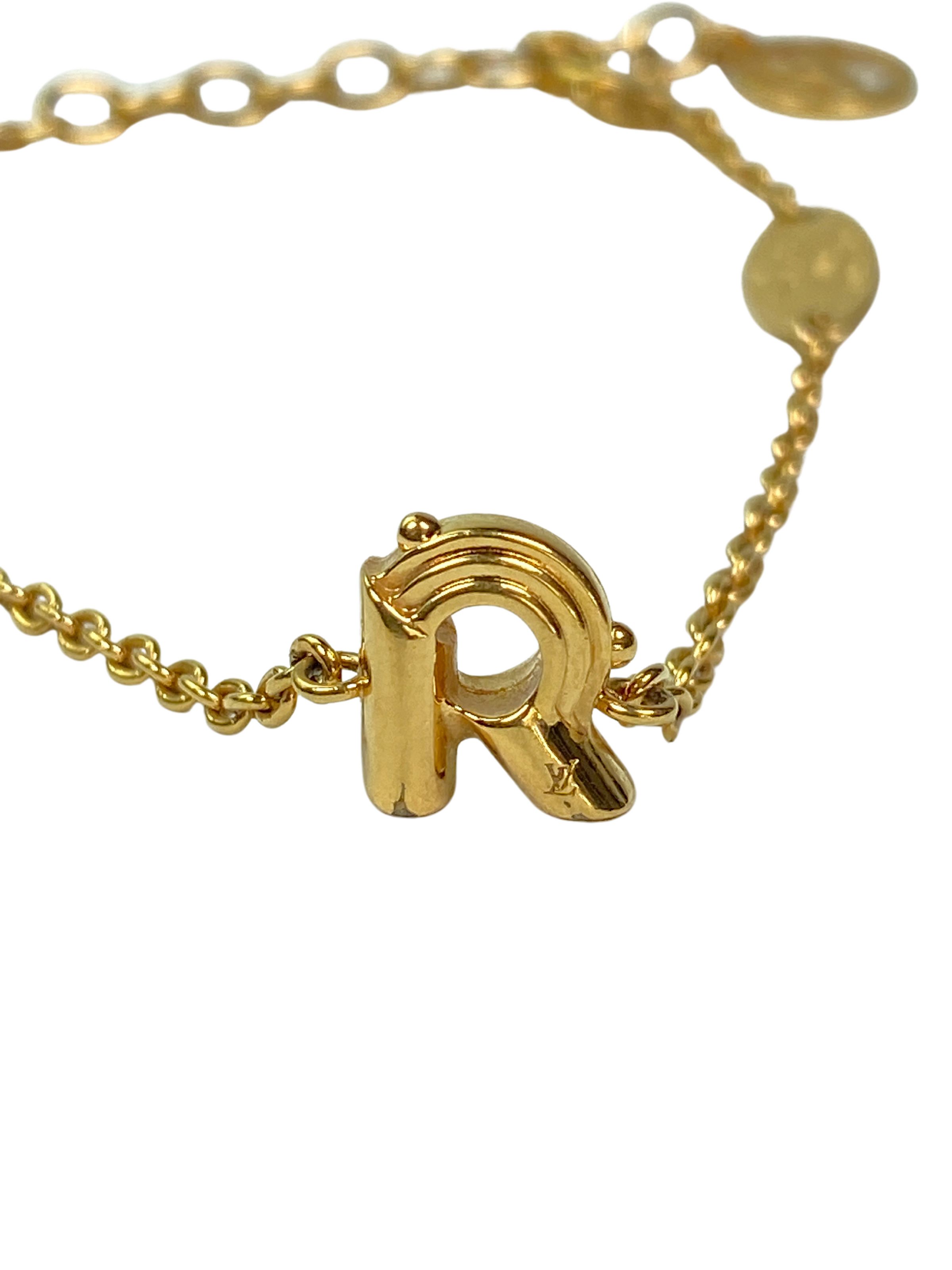 LOUIS VUITTON - LV & ME GOLD TONE BRACELET, LETTER R – RE.LUXE AU