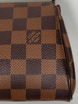 LOUIS VUITTON - EVA CLUTCH IN DAMIER EBENE