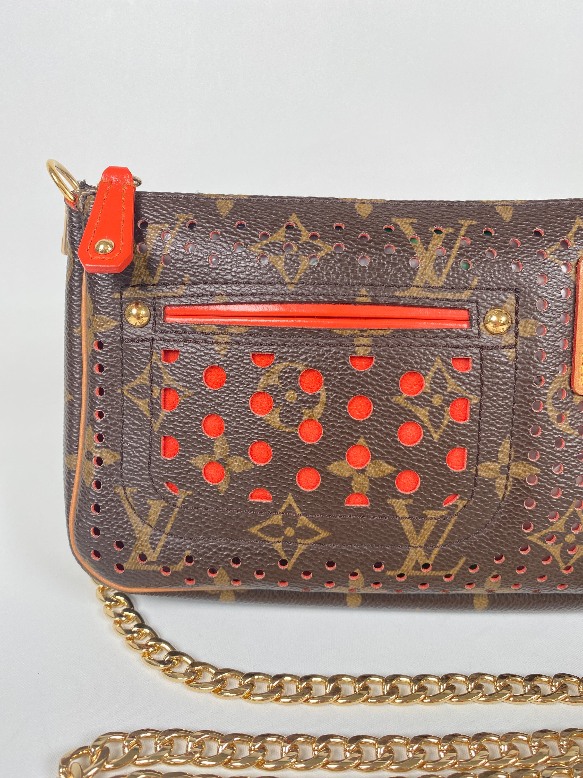 perforated pochette accessories