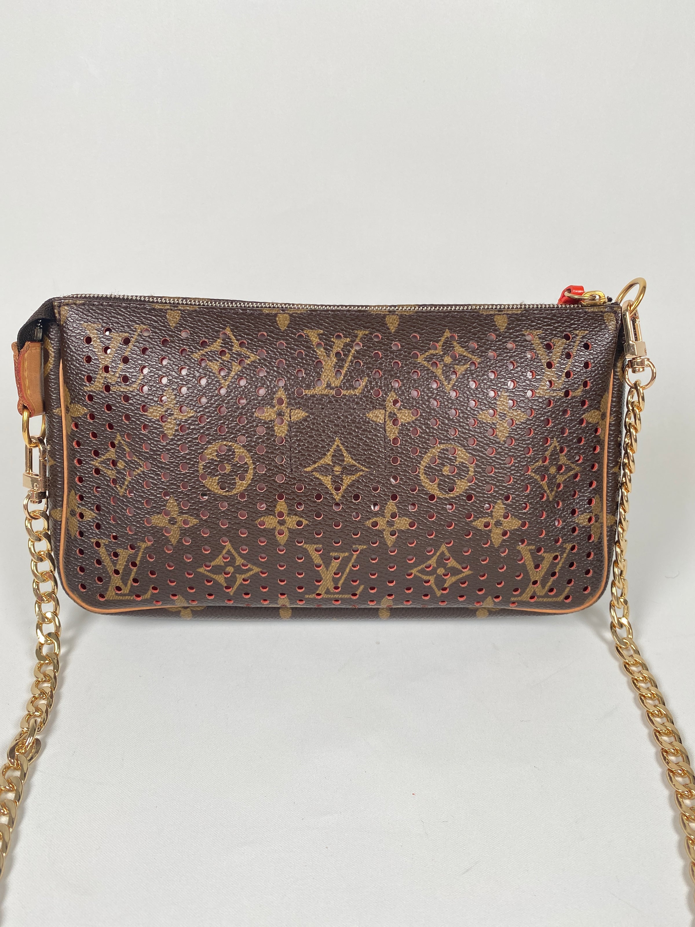 Louis Vuitton Limited Edition Monogram Canvas Perforated Pochette (SHF –  LuxeDH