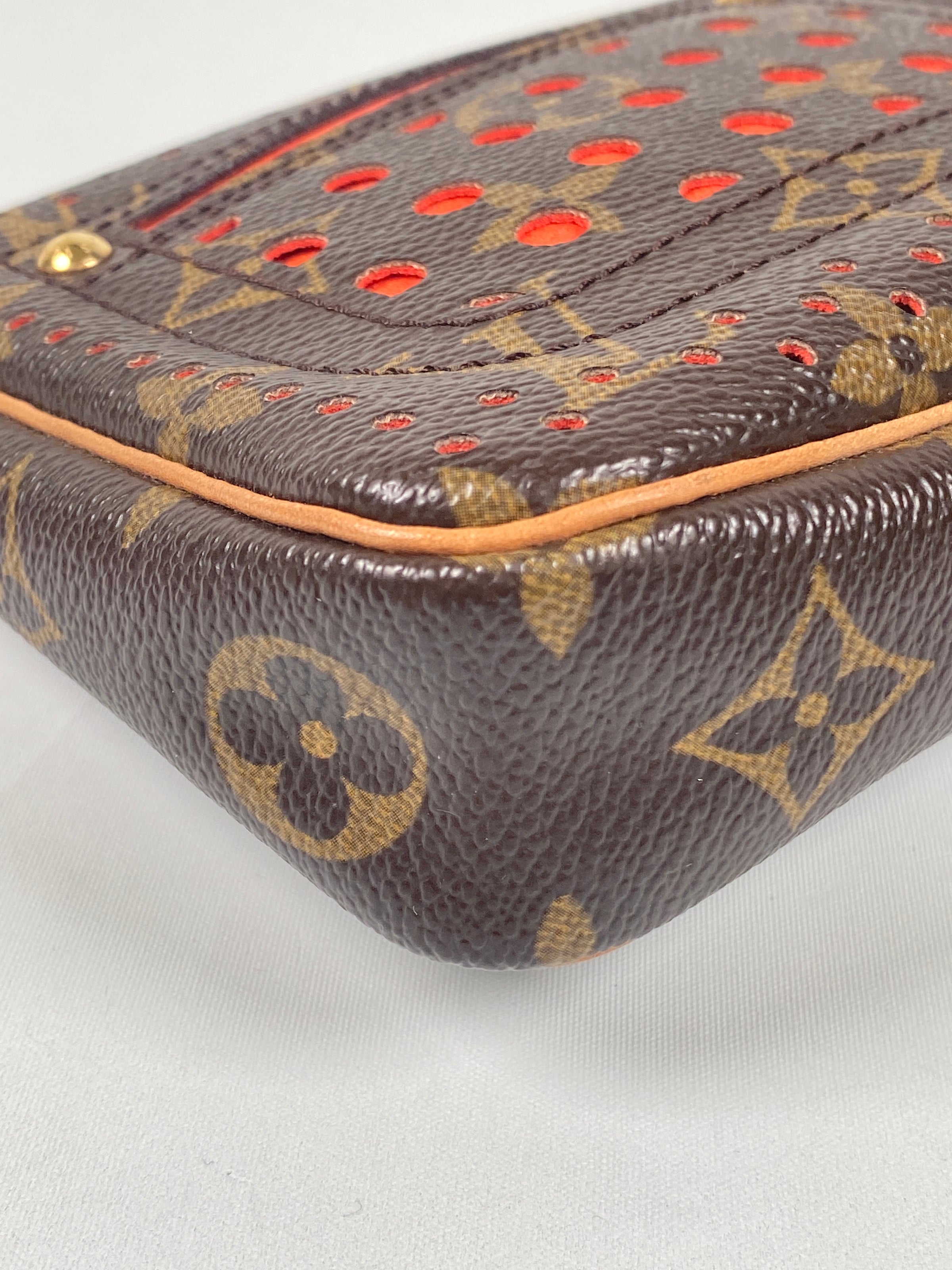 Louis Vuitton Orange Monogram Perforated Pochette Accessoires QJB0C5FJOB003