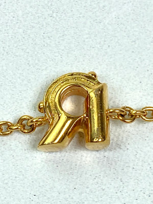 LOUIS VUITTON - LV & ME GOLD TONE BRACELET, LETTER R