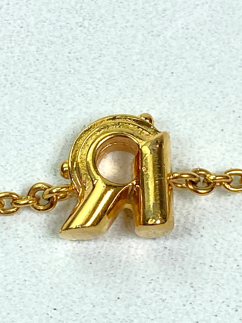 LOUIS VUITTON - LV & ME GOLD TONE BRACELET, LETTER R