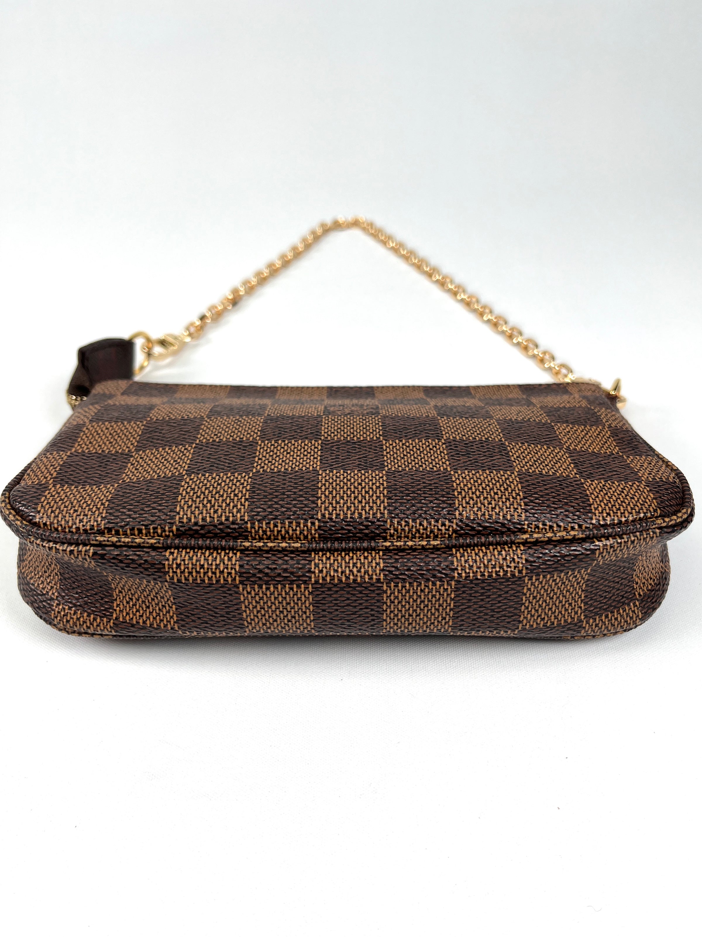 LOUIS VUITTON - BUCKET POCHETTE IN DAMIER EBENE – RE.LUXE AU