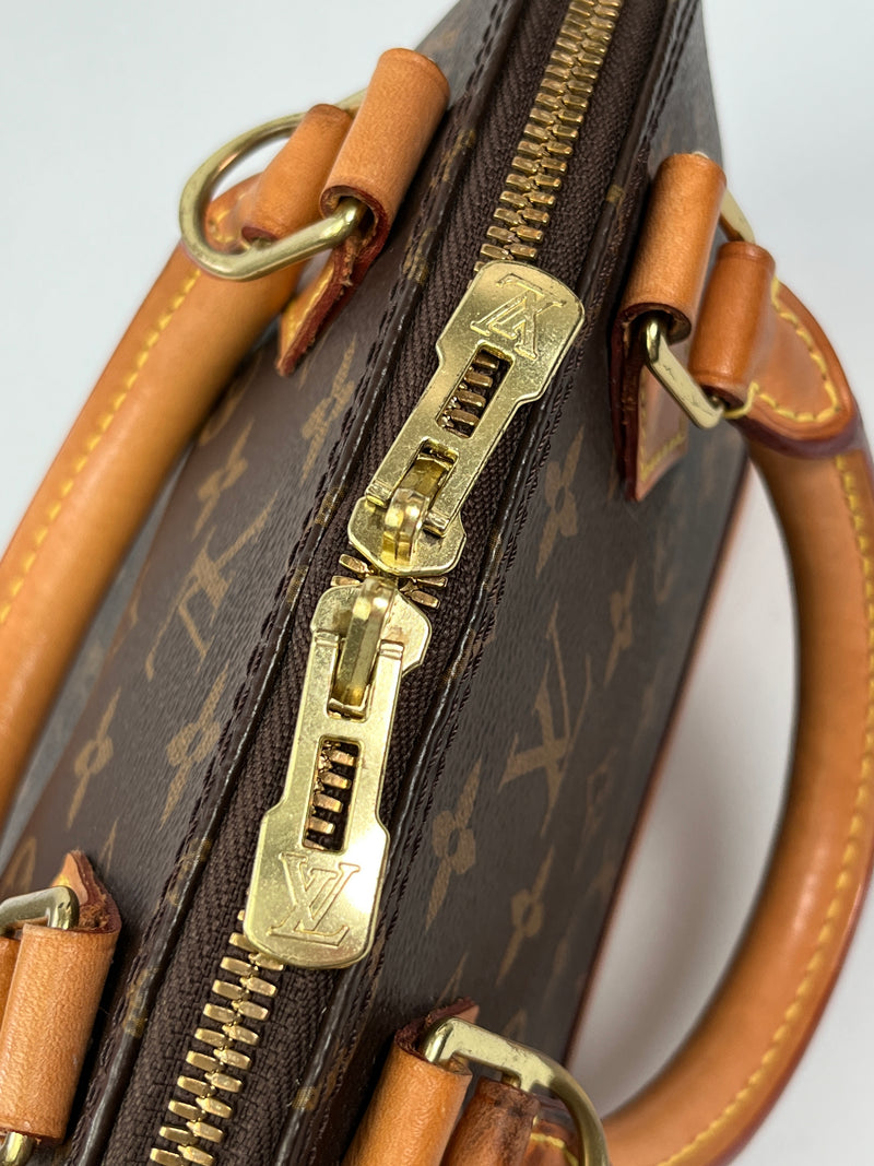 LOUIS VUITTON - ALMA BB IN MONOGRAM CANVAS