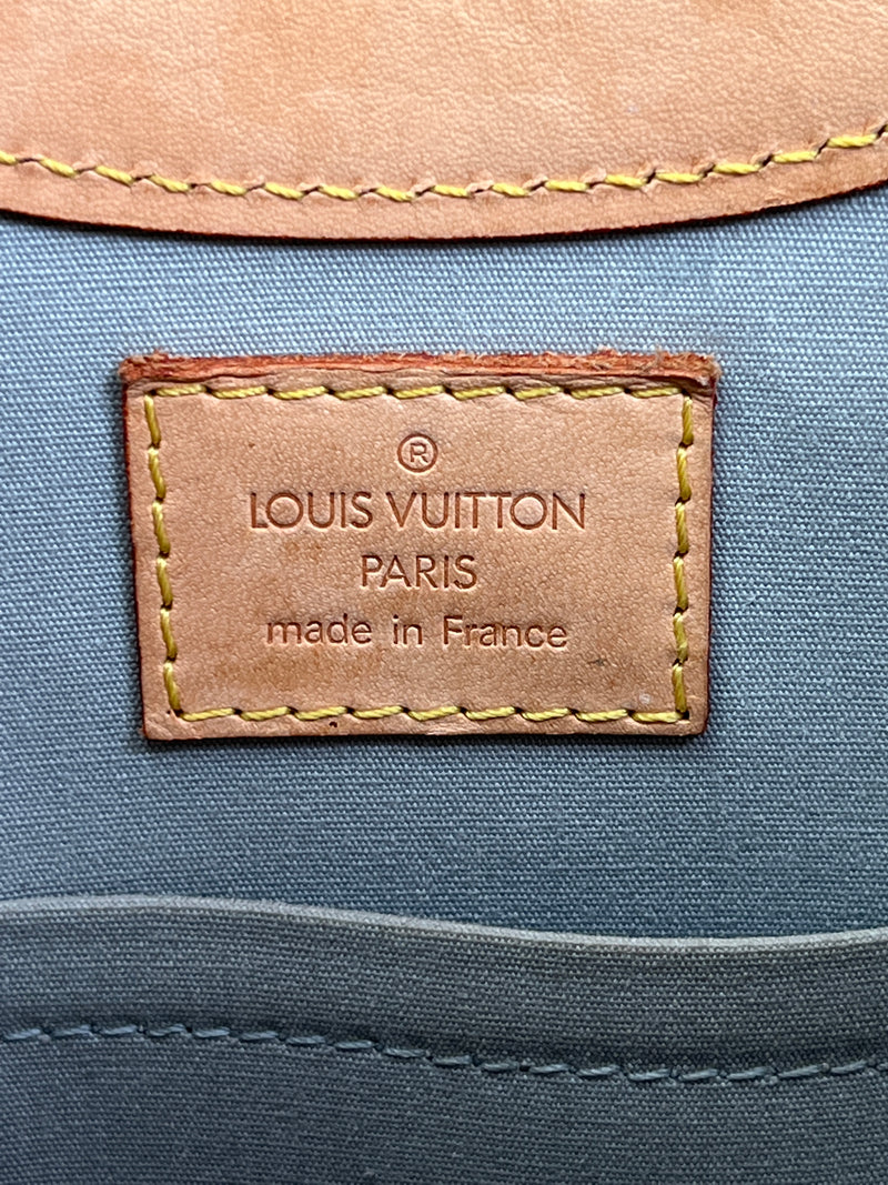 LOUIS VUITTON - STILLWOOD VERTICAL BAG IN PERLE MONOGRAM VERNIS