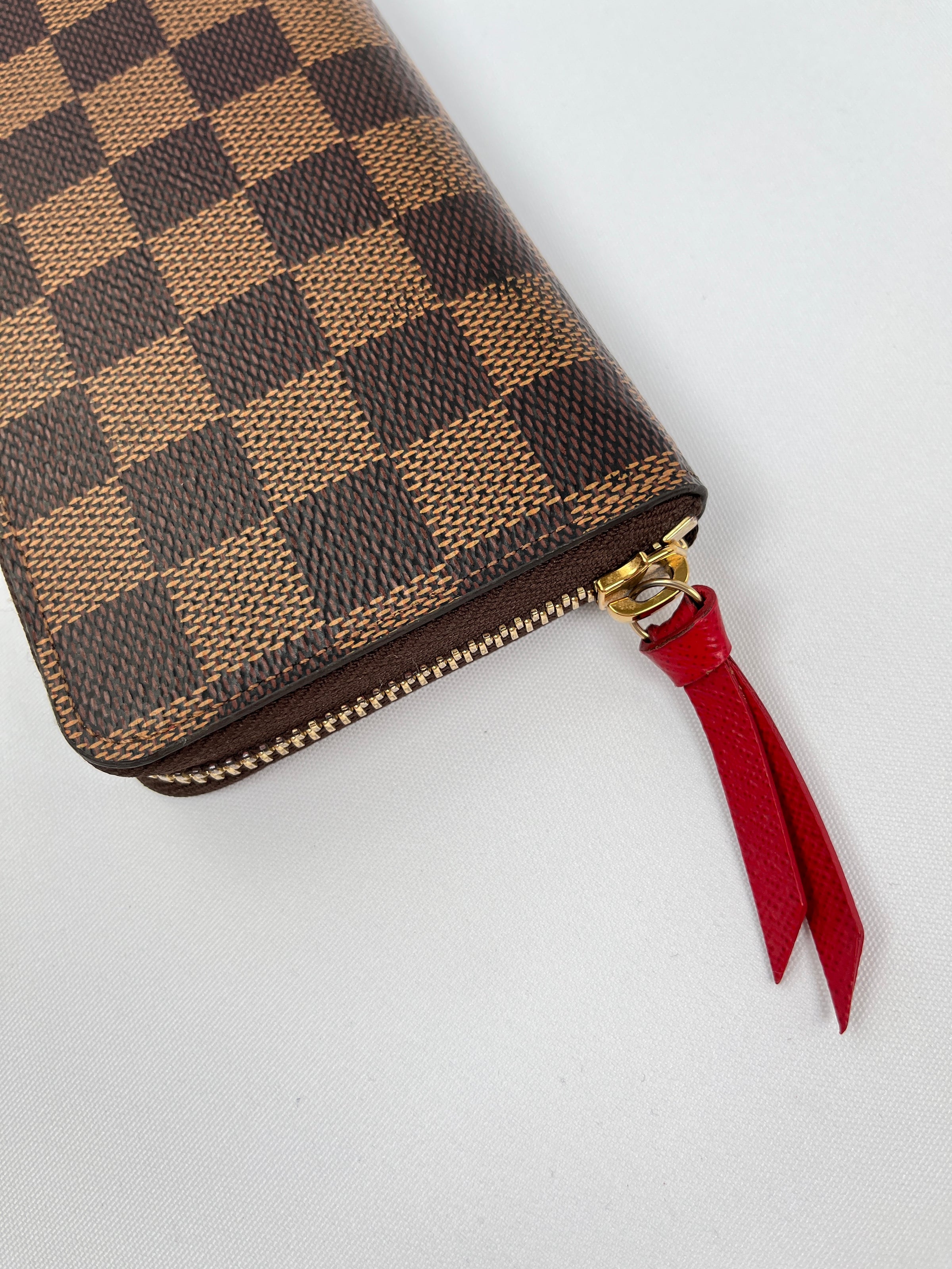 LOUIS VUITTON - CLEMENCE SLIMLINE ZIPPY WALLET DAMIER EBENE – RE.LUXE AU