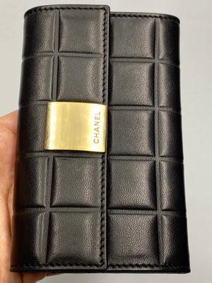 CHANEL -  CHOCOLATE BAR WALLET IN BLACK LEATHER - VINTAGE