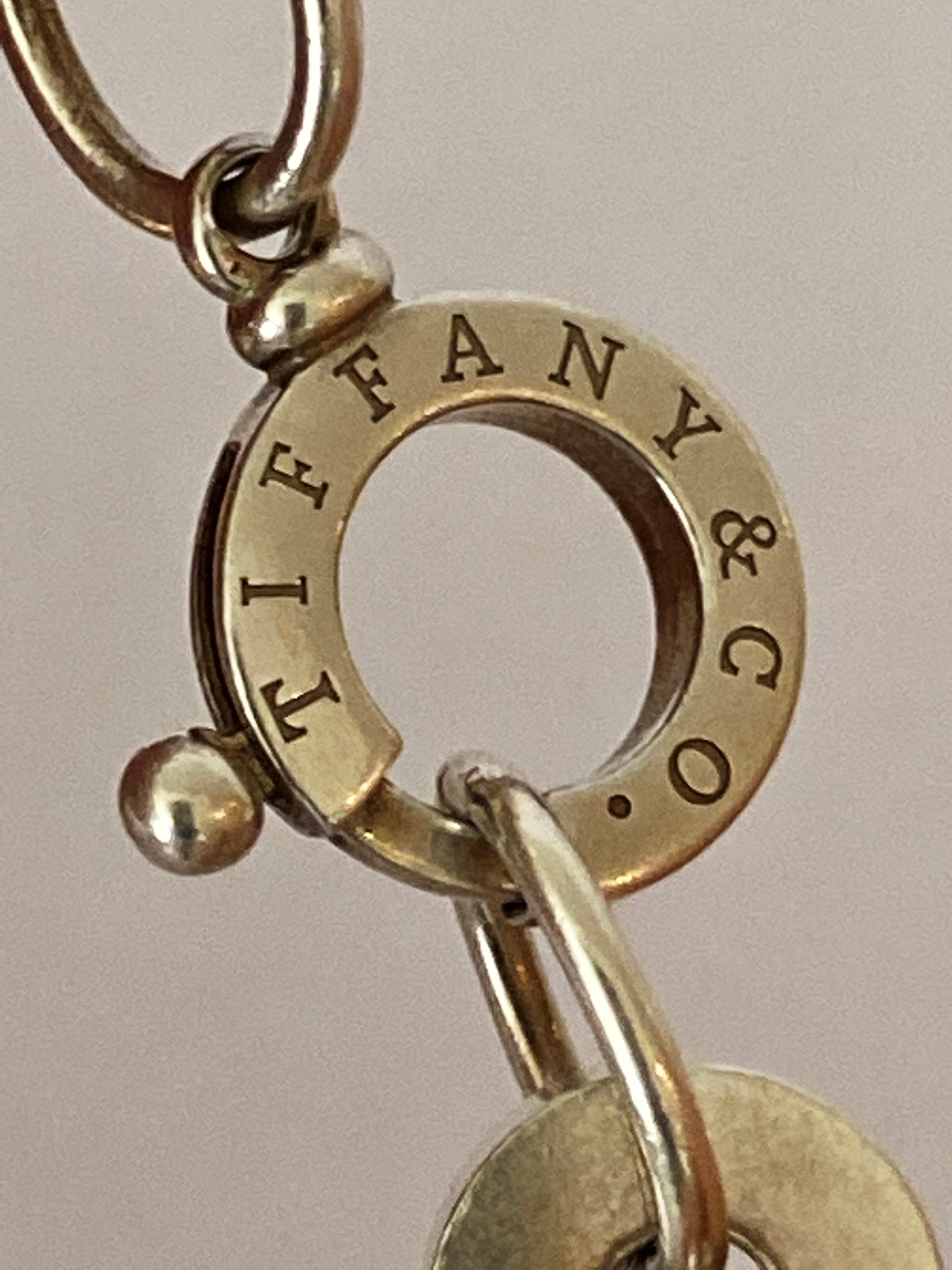 Tiffany disc deals bracelet