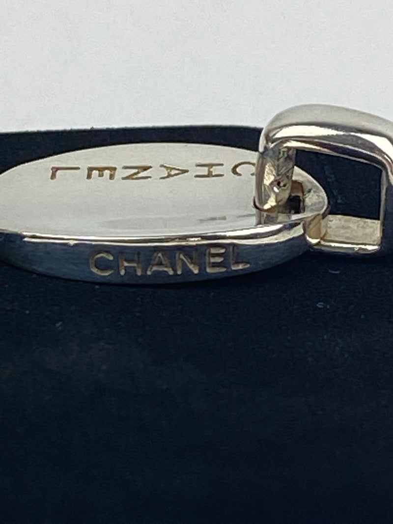 CHANEL - ENGRAVED LOGO EARRINGS IN SILVER